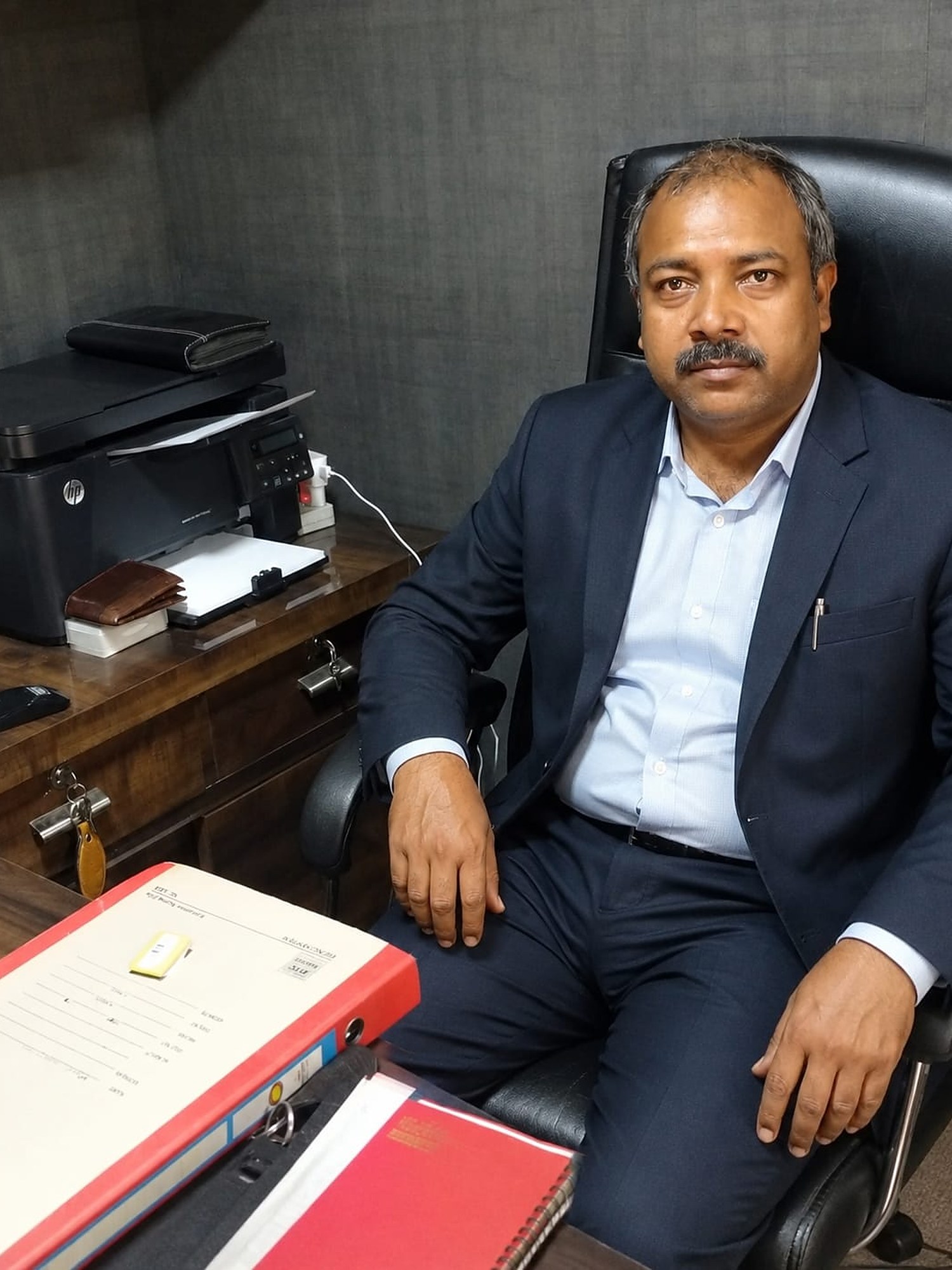 Portrait of Rajesh Jaiswal, Founder of Aadesh Interiors, presented in monochrome